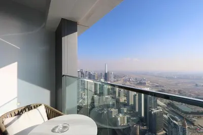 a room with a view of a city at Stunning 1BR with Marina View And Beach Access in Dubai
