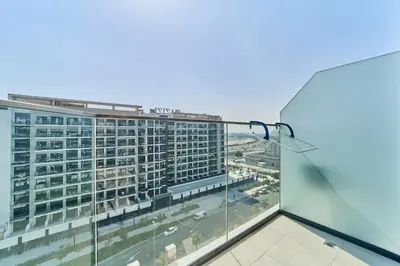 a view from the balcony of a building at Chic Studio in Azizi Riviera with Modern Amenities in Dubai