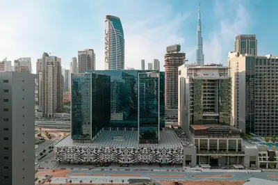 a view of a large city with tall buildings at Burj Khalifa View 1 Bedroom Apartment With Balcony For Up To 4 Person in Dubai