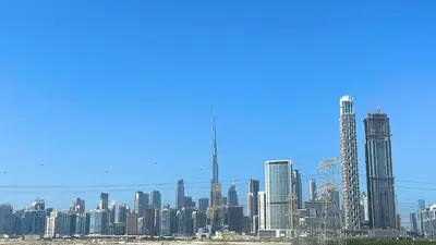 a view of a city skyline with tall buildings at Luxury Interior Studio with Direct Burj Khalifa Views in the Heart of Dubai in Dubai