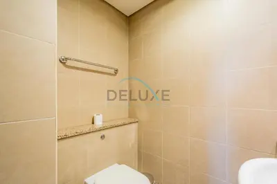 a bathroom with a toilet and a shower at Stylish 2BR in Sky Gardens, DIFC by Deluxe Holiday Homes in Dubai