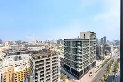 an aerial view of a city with tall buildings at Spacious 2 Bedroom in JVC with pool & gym access in Dubai