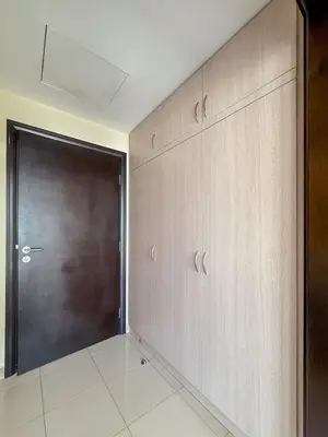 a large door in a room with a wall at Luxurious 2BR in Dubai Marina next to metro in Dubai