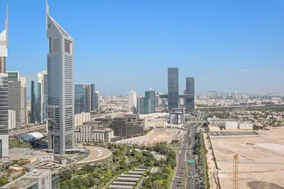 a view of a city with a tall building at Silkhaus Gallery Studio at Sky Gardens in Heart of DIFC in Dubai
