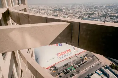 a view of a sign on the side of a building at NEW Cozy & Stylish APT with Pool & Gym Access in Dubai