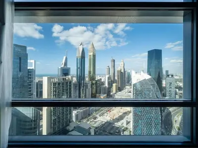 a view of a city skyline from a window at Luxury 1-Bed DIFC Stay - City Views in a Prime Area in Dubai