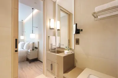 a bathroom with a sink and a mirror at 1BHK with Marina Views and Beach Access in Dubai