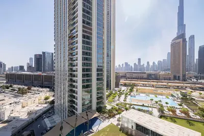 an aerial view of a tall building in a city at Dubai Mall Connected! AMAZING Burj Khalifa View! Excellent Pool & Gym Access! in Dubai