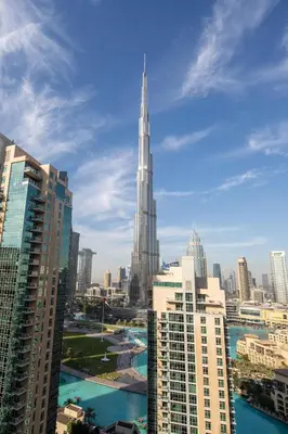 a view of a city skyline with a tall skyscraper at Frank Porter - The Residences Tower 8 in Dubai