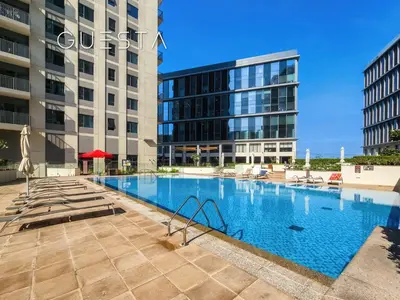 a swimming pool in the middle of a building at Park Heights 1 by Emaar, Dubai Hills Estate in Dubai