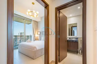 a bedroom with a bed and a balcony at Sea View 3BR with Assistant Room and Balcony, Just Steps from Marina Promenade, 5242 Tower 1, Dubai Marina by Deluxe Holiday Homes in Dubai