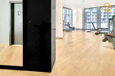 a room with a gym with treadmills and machines at Keysplease 1BR Apartment Damac Maison Prive Business Bay in Dubai