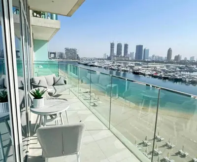 a balcony with a view of a marina at Dubai Harbour in Dubai