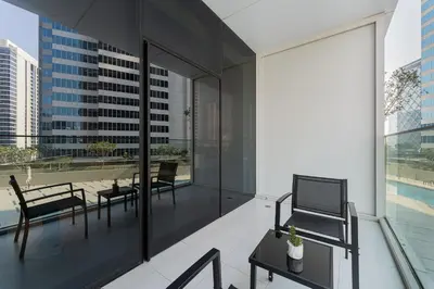 a balcony with a view of a building at HAVN - New Studio Business Bay, Burj Khalifa View in Dubai