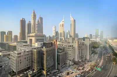 an aerial view of a large city with traffic at Silkhaus Cozy Studio at Sky Gardens-Heart of DIFC in Dubai