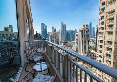 a balcony with a view of a city skyline at Luxurious one bedroom Apartment with Burj Khalifa View in Dubai