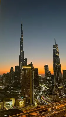 a view of a city with a lot of tall buildings at Full Burj view & Direct Access to Dubai Mall in Dubai