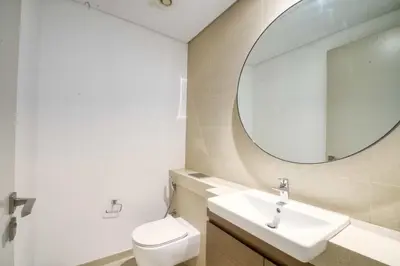 a bathroom with a sink and a mirror at Dubai dream villa Emaar in Dubai