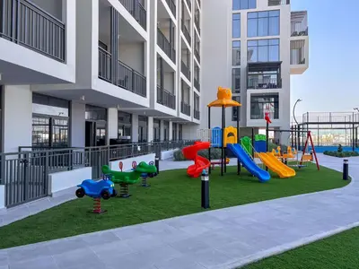 a playground in the middle of a apartment building at Frank Porter - Legacy by Sunrise in Dubai