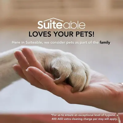 a hand with a small animal on top of it at Luxury 1 Bedroom in the Heart of Famous Downtown in Dubai