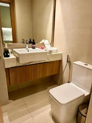 a bathroom with a sink and a toilet at 8min from Downtown in Dubai
