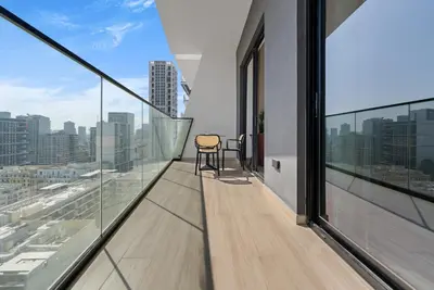 an apartment balcony with a view of the city at Magnificent - New Modern 1BR in Binghatti Heights in Dubai