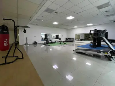 a gym with a treadmill and treadles in a room at Stunning Hideaway in Dubai Marina in Dubai