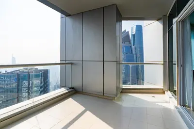 an empty room with windows in a skyscraper at Classy Upgraded - High Floor - Prime Location in Dubai