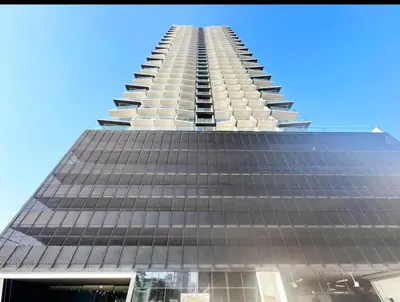 a tall building with a lot of windows on it at Binghatti Heights JVC in Dubai