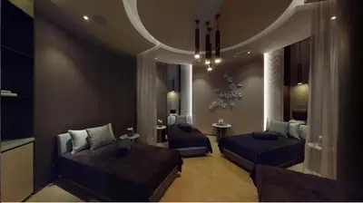 a living room with two beds and a chandelier at Exceptional high floor 3bed apartment by Suiteable in Dubai