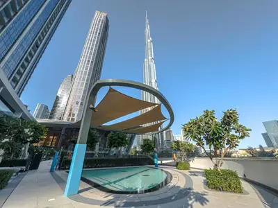 a view of the burj khalifa from the city at Grande Signature Residence, Burj Khalifa and Fountain View in Dubai