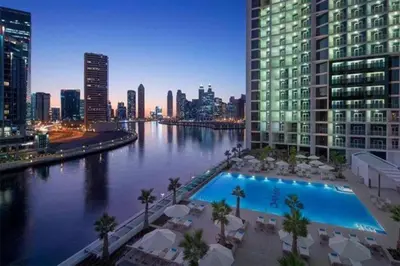 a view of a river in a city with buildings at Business Bay Modern studio with a Pool view at DAMAC Maison Prive in Dubai