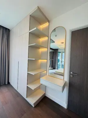 a room with a closet with a mirror at Marina View Tower A in Dubai
