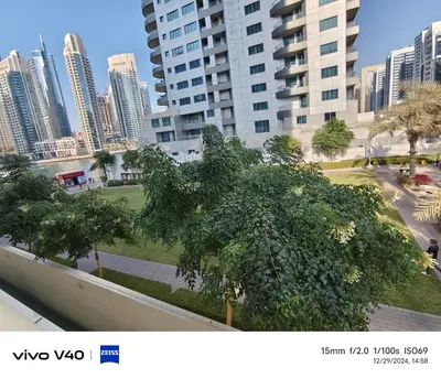 a view of a park in a city with tall buildings at Marina View Tower A in Dubai