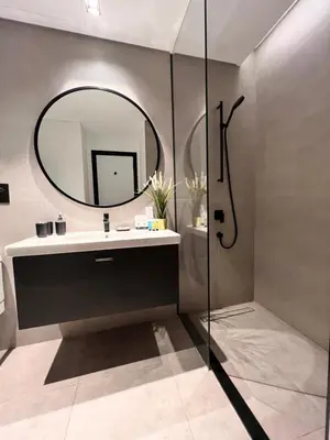 a bathroom with a sink and a mirror at Gennaro's Home at 15 Northside Business Bay in Dubai