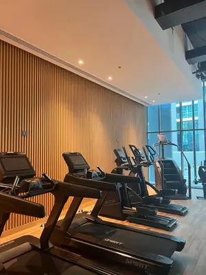 a row of treadmills in a gym at Suite in Seven Palm Corner Unit Rooftop Floor in Dubai