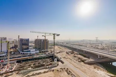 an overhead view of a bridge under construction at GLOBALSTAY Azizi Riviera 48 in Dubai