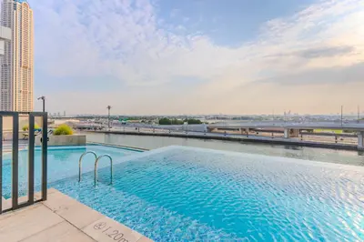 a swimming pool on the roof of a building at DAYF-DAN Missoni Apartment with Private Lift in Business Bay in Dubai