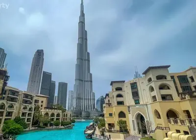a view of the burj khalifa from the city at Luxury Downtown Dubai Stay Next to Mall of Dubai in Dubai