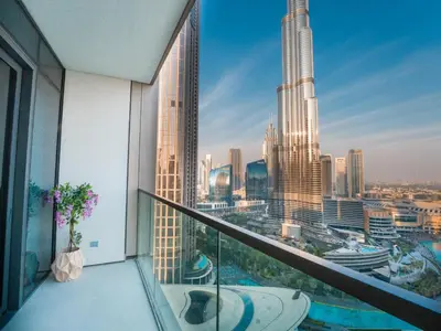 a balcony with a view of a city at EasyGo-Core Luxury 2BDR in Grande Signature Res panoramic view in Dubai