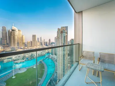 a balcony with a view of a city at EasyGo-Core Luxury 2BDR in Grande Signature Res panoramic view in Dubai