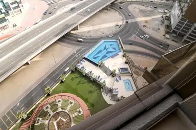 an overhead view of a building with a road at Luxurious Elite Studio-DownTown in Dubai