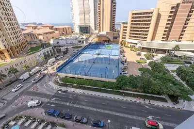 an overhead view of a city with a swimming pool at Premium 2 Bedroom in Trident Residence JBR in Dubai
