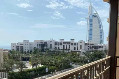 a view from a balcony of a city with a building at 1 Bedroom Apartment with Burj AlArab View from your Balcony R507 in Dubai