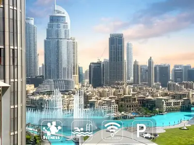 a view of a city skyline with a fountain at Stylish 2 Bedroom Opera View in Downtown Dubai SP2013 in Dubai