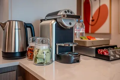 a kitchen counter with a mixer on a counter top at Luxury 1-Bedroom Holiday Apartment in Downtown Dubai I Walk to Dubai Mall and Fountains in Dubai