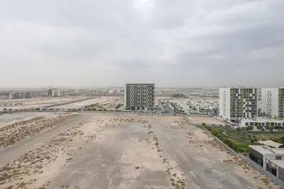 an empty road in the middle of a city at Frank Porter - Pulse C1 in Dubai