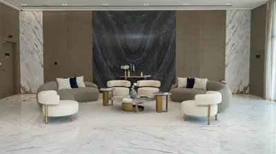 a living room with couches and chairs and a table at Sleek 1br Apt Jvc Quiet Space With Pool & Par in Dubai