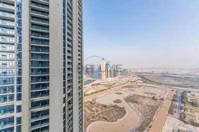 an aerial view of a city with tall buildings at Unbeatable Rate Modern 2BR with Partial Canal Views by Deluxe Holiday Homes in Dubai