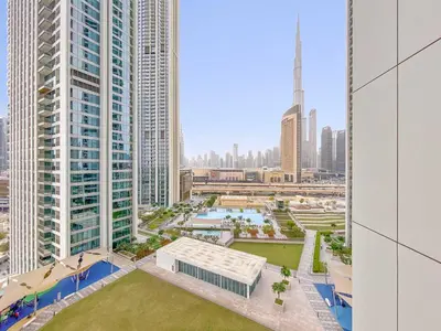 an aerial view of a city with tall buildings at Silkhaus Deluxe 2BR in Downtown Views II in Dubai